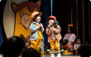 Students performing on stage at a school event